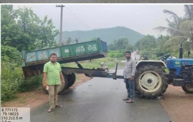 భారీ వర్షం...రెండు గ్రామాలకు రాకపోకలు బంద్