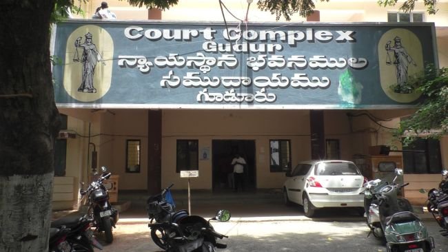 గిరిజనుడి భూమి తిరిగి అప్పగించండి