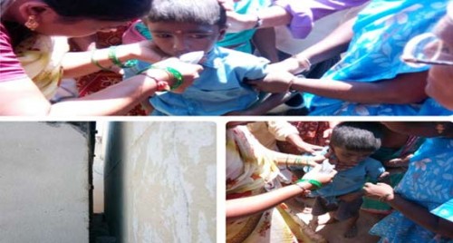 రెండు ఇళ్ల మధ్యలో ఇరుక్కున్న బాలుడు