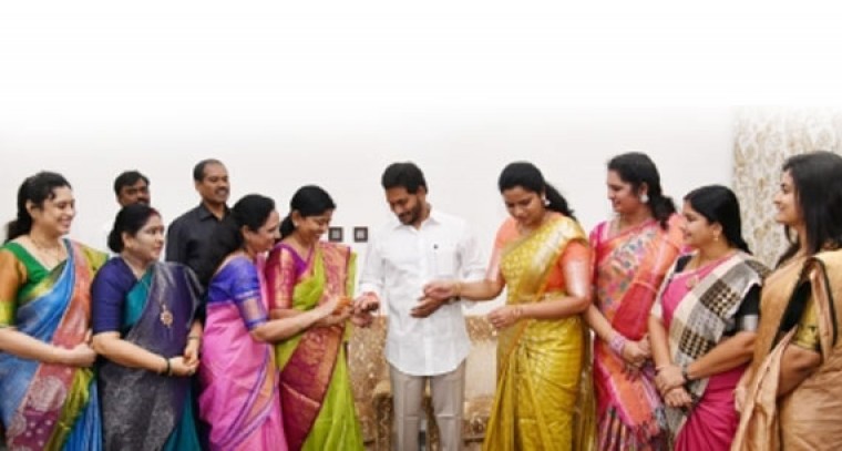 Andhra women ministers tie Rakhi to CM Jagan