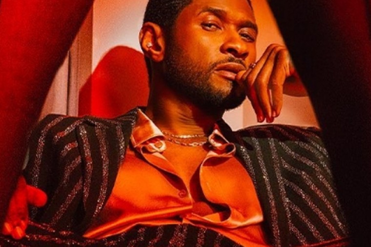Usher has a ball with his kids in new dance video