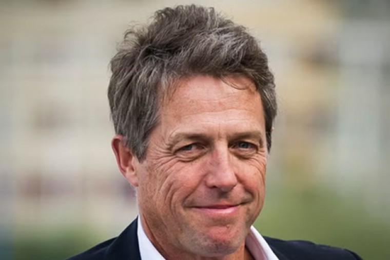 Hugh Grant calls for ban on laptops, tablets in school
