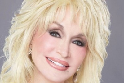 Dolly Parton reacts to Keanu Reeves telling he once wore her Playboy costume