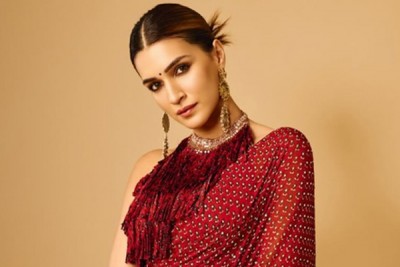 Kriti Sanon shares a candid moment of filmmaker Aanand L. Rai calmly sleeping on a flight