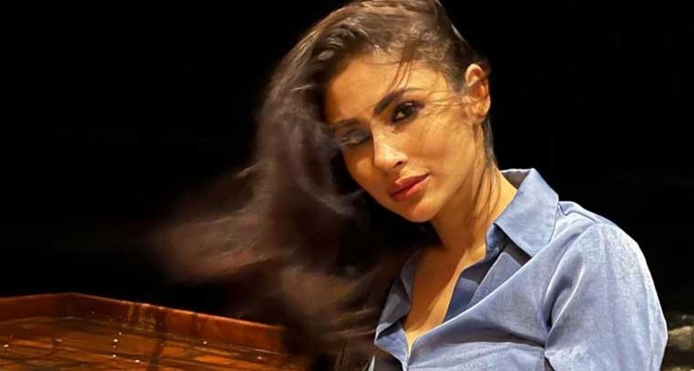 బ్లూ కలర్ షార్ట్ డ్రెస్ లో మౌని రాయ్ 