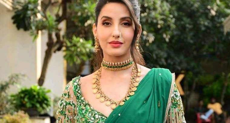 గ్రీన్ శారీ లో తళుక్కుమని మెరిసిన నోరా ఫతేహి !