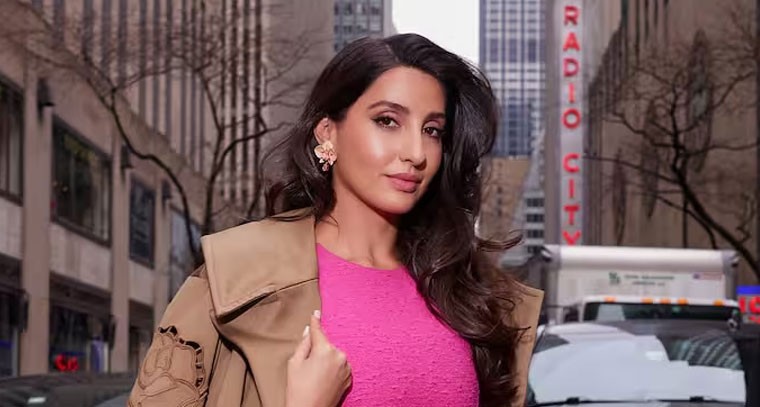 పింక్ డ్రెస్ లో  నోరా ఫతేహి స్టిల్స్ 