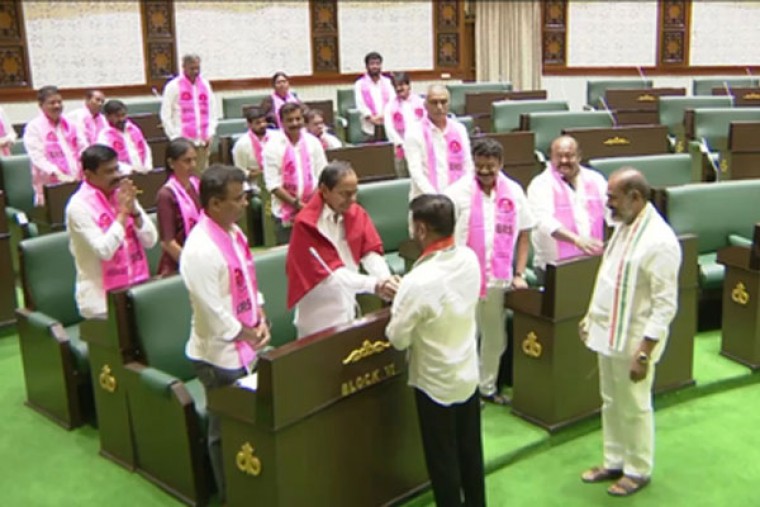 Amid bitter war of words, Revanth Reddy shakes hands with KCR