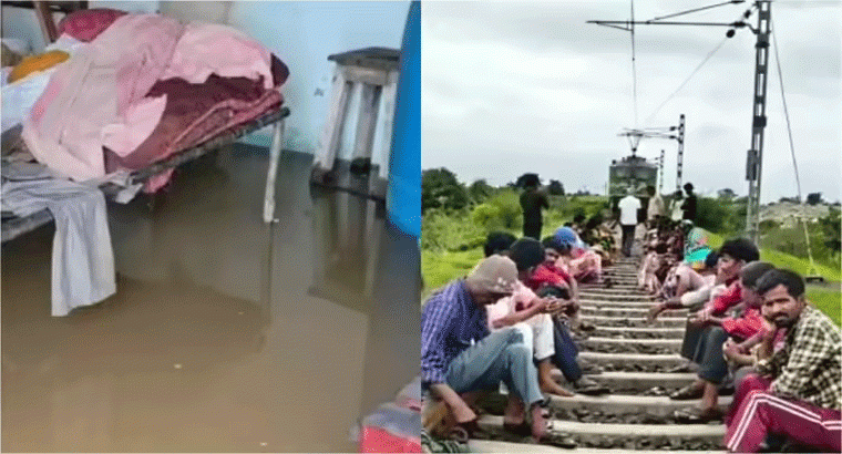 ఆ గ్రామంలోని ఇళ్లల్లోకి వరద నీరు.. గూడ్స్ రైలును అడ్డుకున్న గ్రామస్థులు