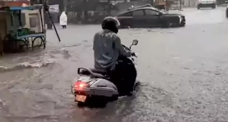 హైదరాబాద్ శివార్లను ముంచెత్తిన వర్షం.. ట్రాఫిక్‌కు బ్రేక్, జనానికి బ్రాంట్

