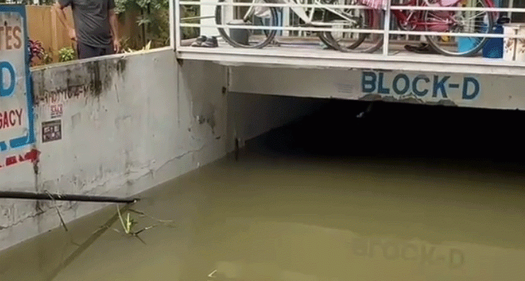 స్విమ్మింగ్ పూల్ ను తలపిస్తున్న అపార్ట్మెంట్ సెల్లార్