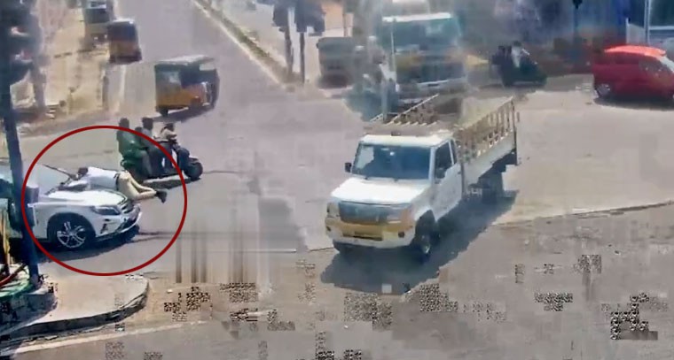 ట్రాఫిక్ కానిస్టేబుల్‌ను ఈడ్చుకెళ్లిన కారు.. సీసీ ఫుటేజ్